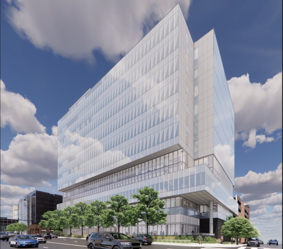 An artist 's impression of a large building with a lot of windows