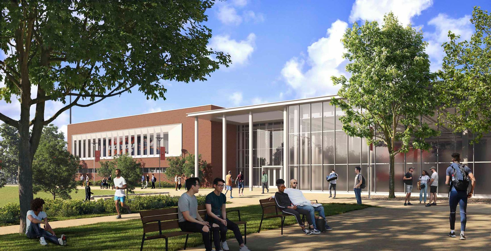 a group of people are sitting on benches in front of a large building .
