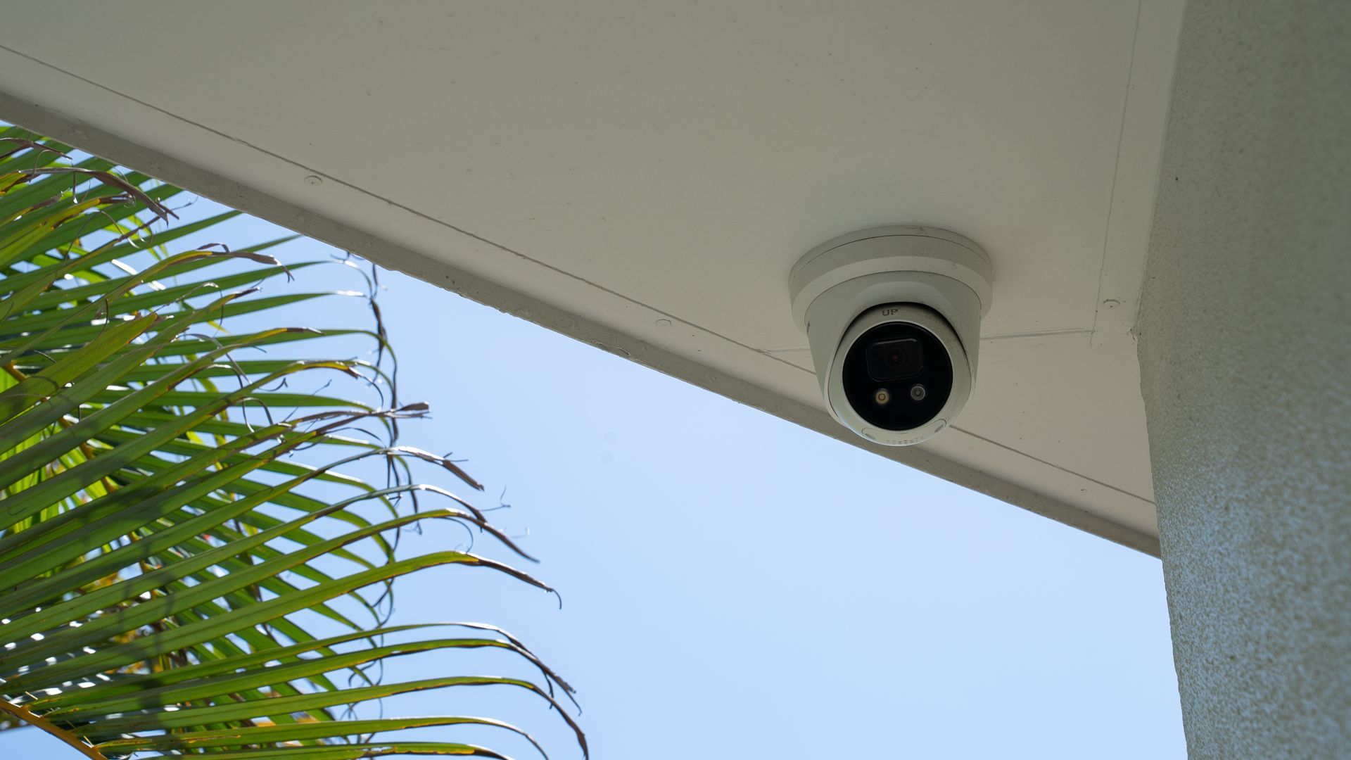 Outdoor Security Camera Mounted Under a Roof — Ralph Ottmann Electrical in Pomona, QLD