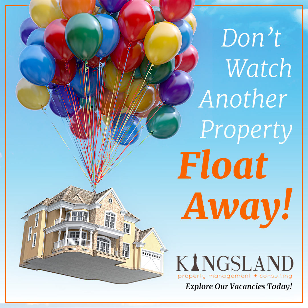 A house is being lifted in the air by balloons.