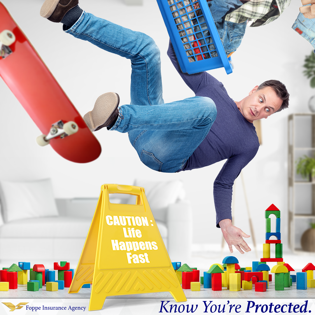A man is falling off a skateboard next to a yellow sign that says caution life happens fast