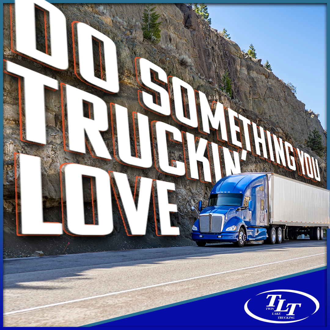 A truck is parked in front of a sign that says `` do something you love ''.
