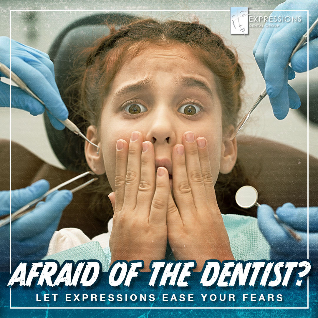 A little girl is afraid of the dentist.