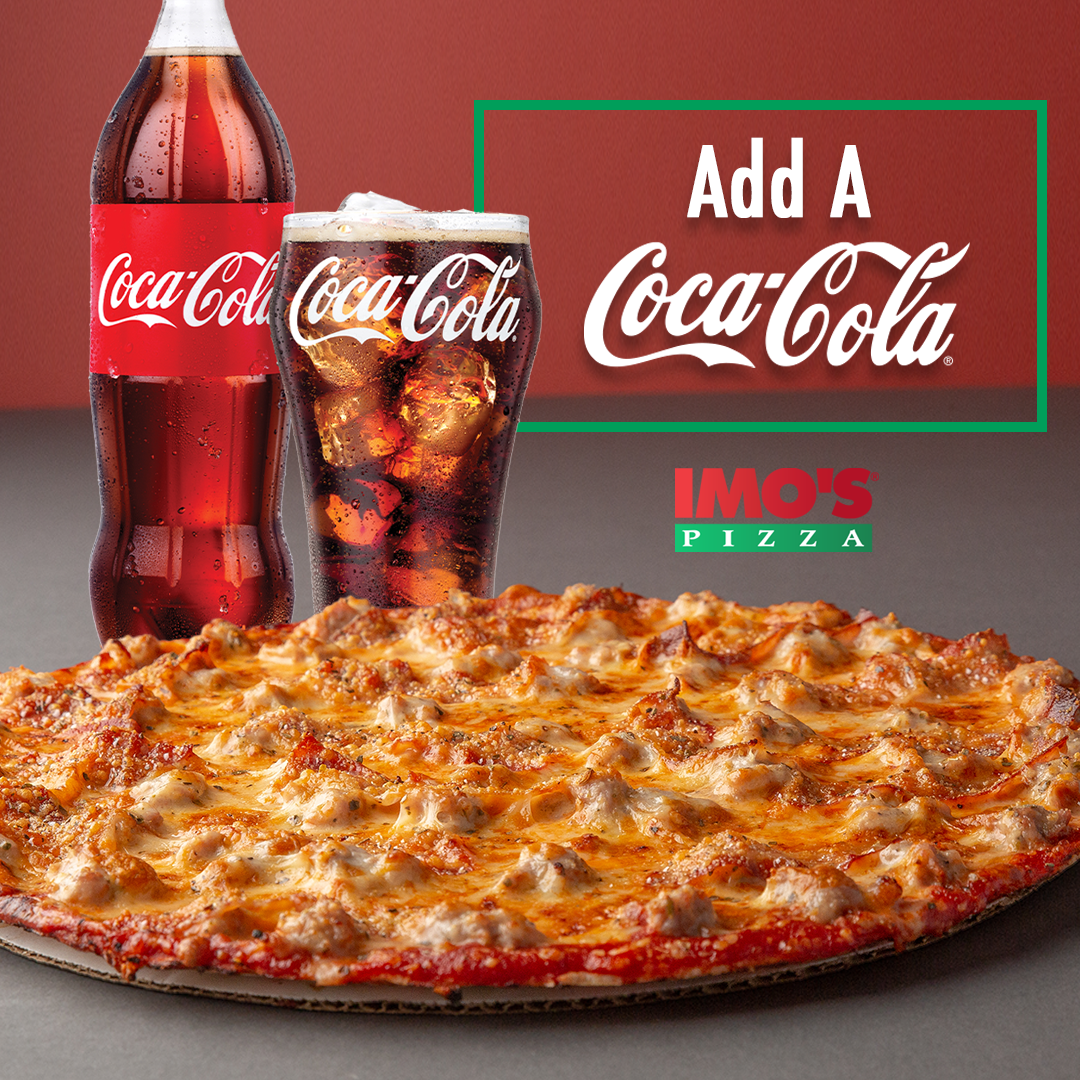 A pizza with a bottle of coca cola and two glasses of coca cola next to it.