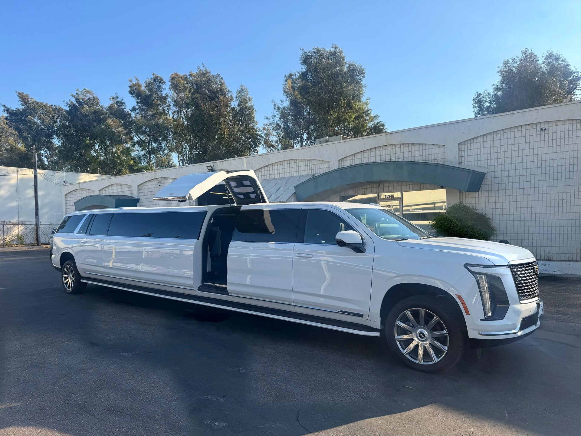 2027 Cadillac Escalade Stretch Limo jet door open - RPD Limo