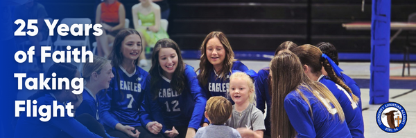 A group of young athletes in blue uniforms celebrate with small children. Text reads,