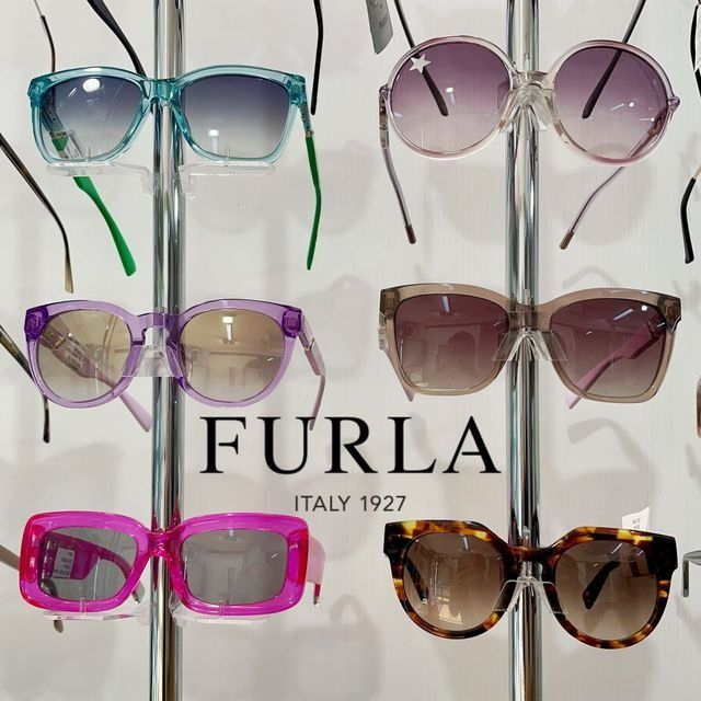 Sunglasses Displayed on a Stand — EyeMax EyeCare in Wallsend, NSW