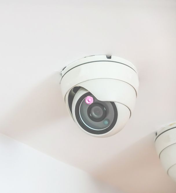Security CCTV Camera Hanging On The White Ceiling — John B Electrical In Thurgoona NSW