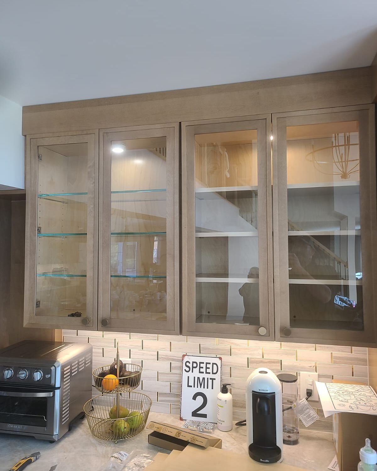 A kitchen with a sign that says speed limit 2