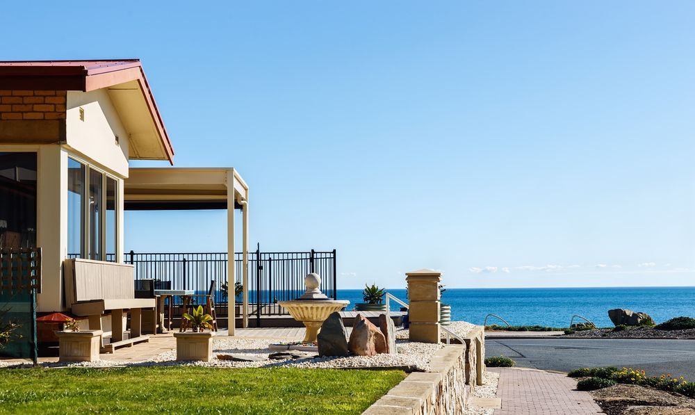 A House With A Balcony Overlooking The Ocean — Settle Petal Mobile Conveyancing In Diamond Beach, NSW