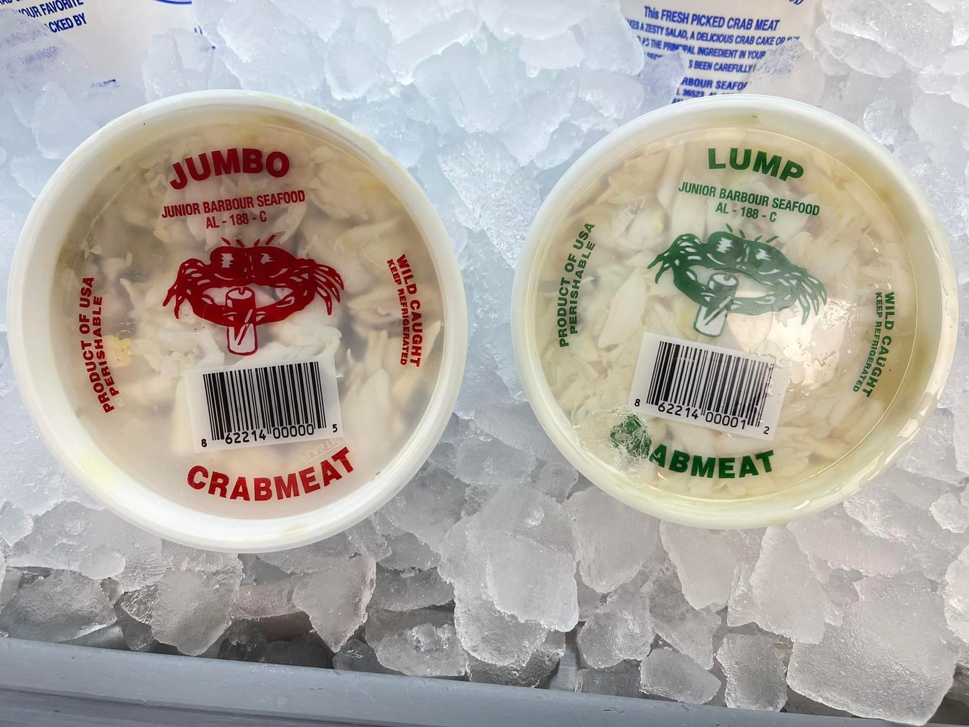 Two containers of crabmeat, one labeled 