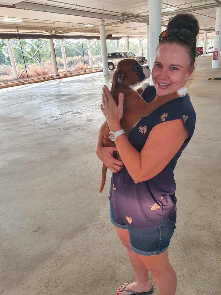 Owner Holding Her Puppy - Pet Waggin, Australia Wide