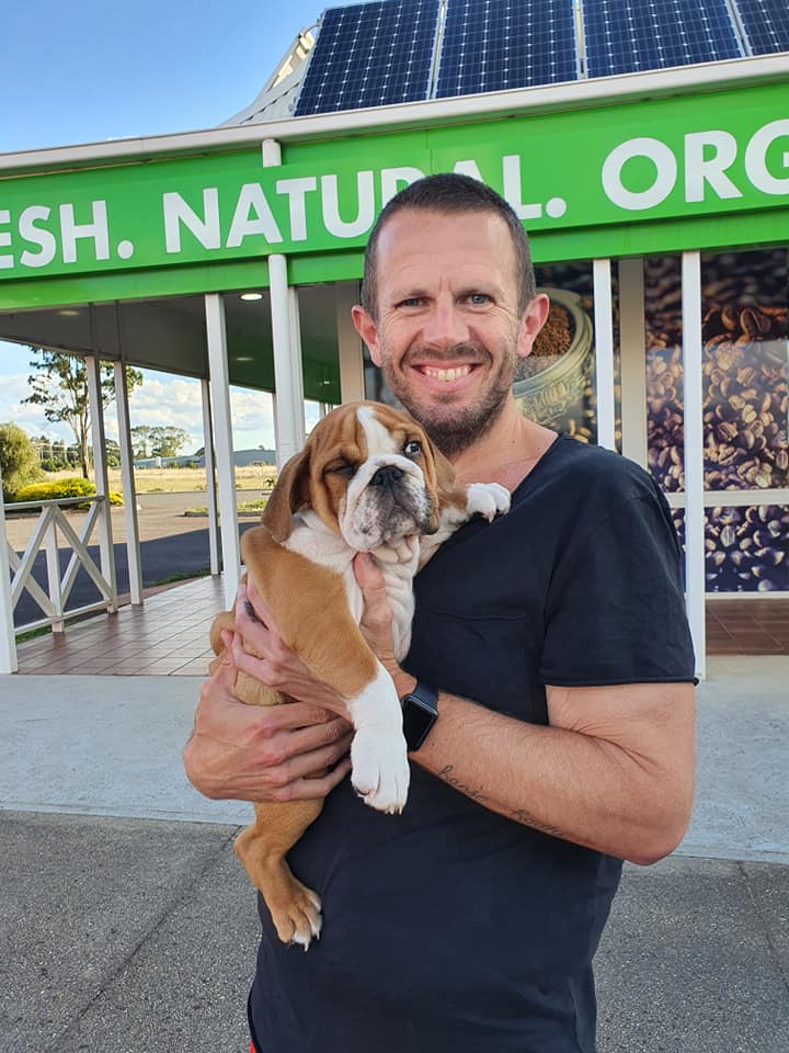 Man with His Puppy — Pet Transport Specialists in Rockville, QLD