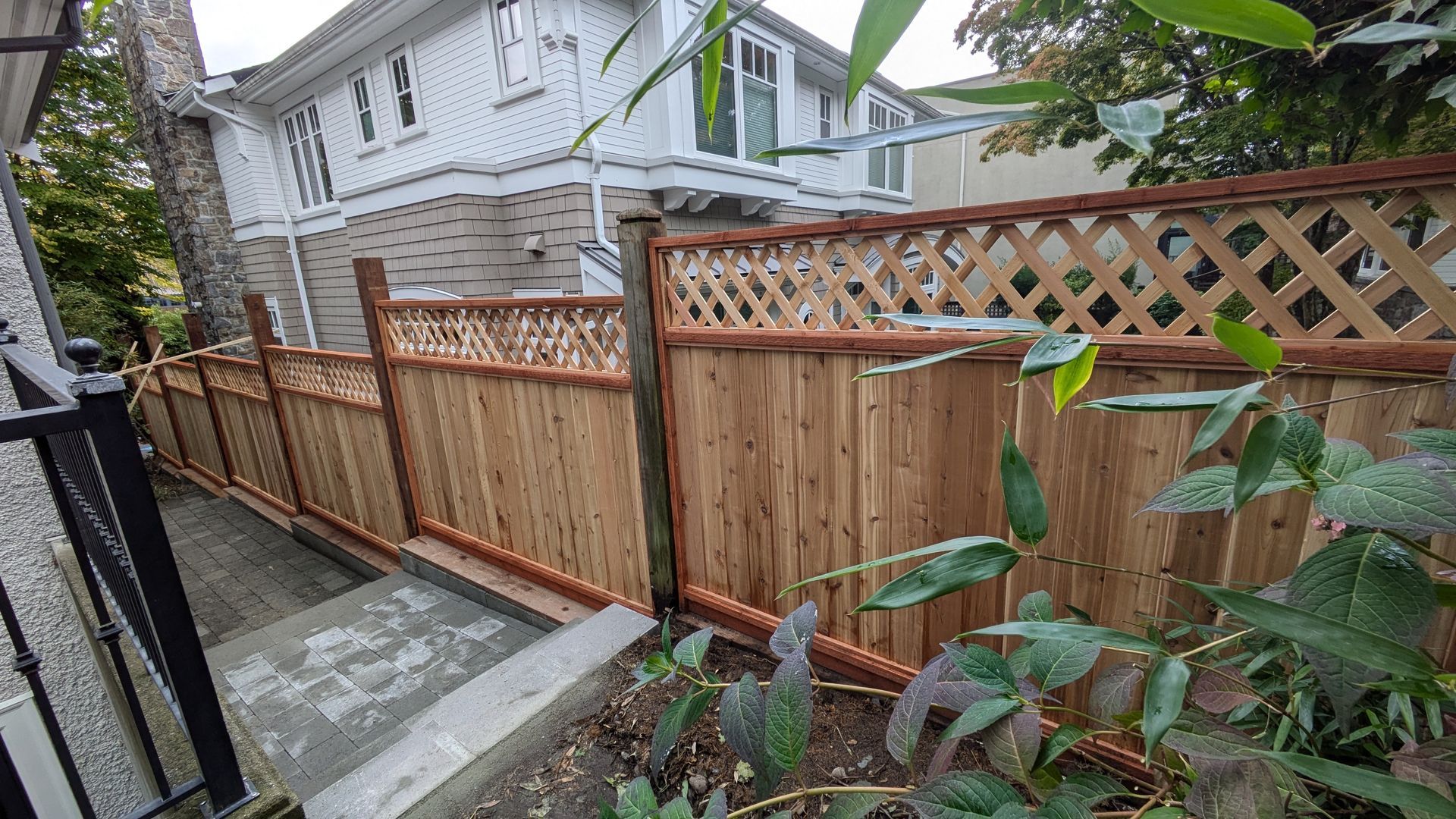 New wooden fence installed in back yard