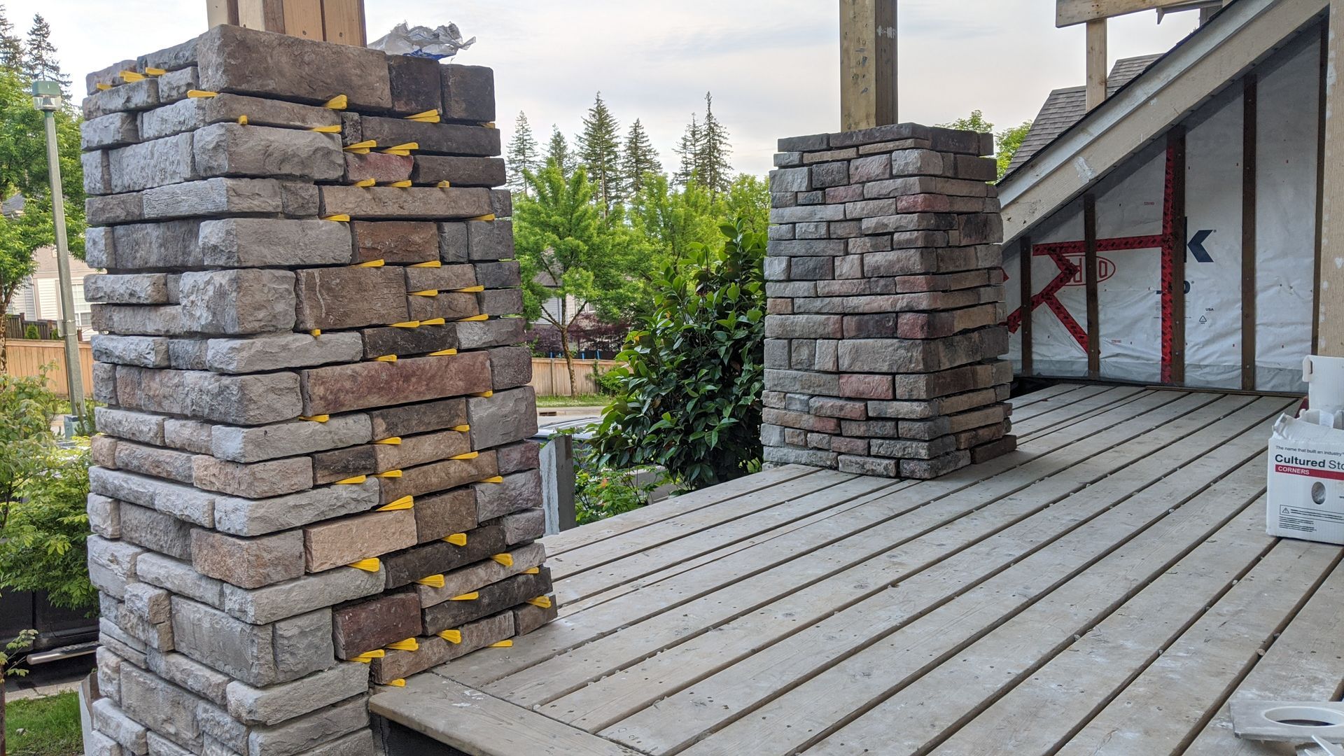 New stone pillars installed for back yard deck