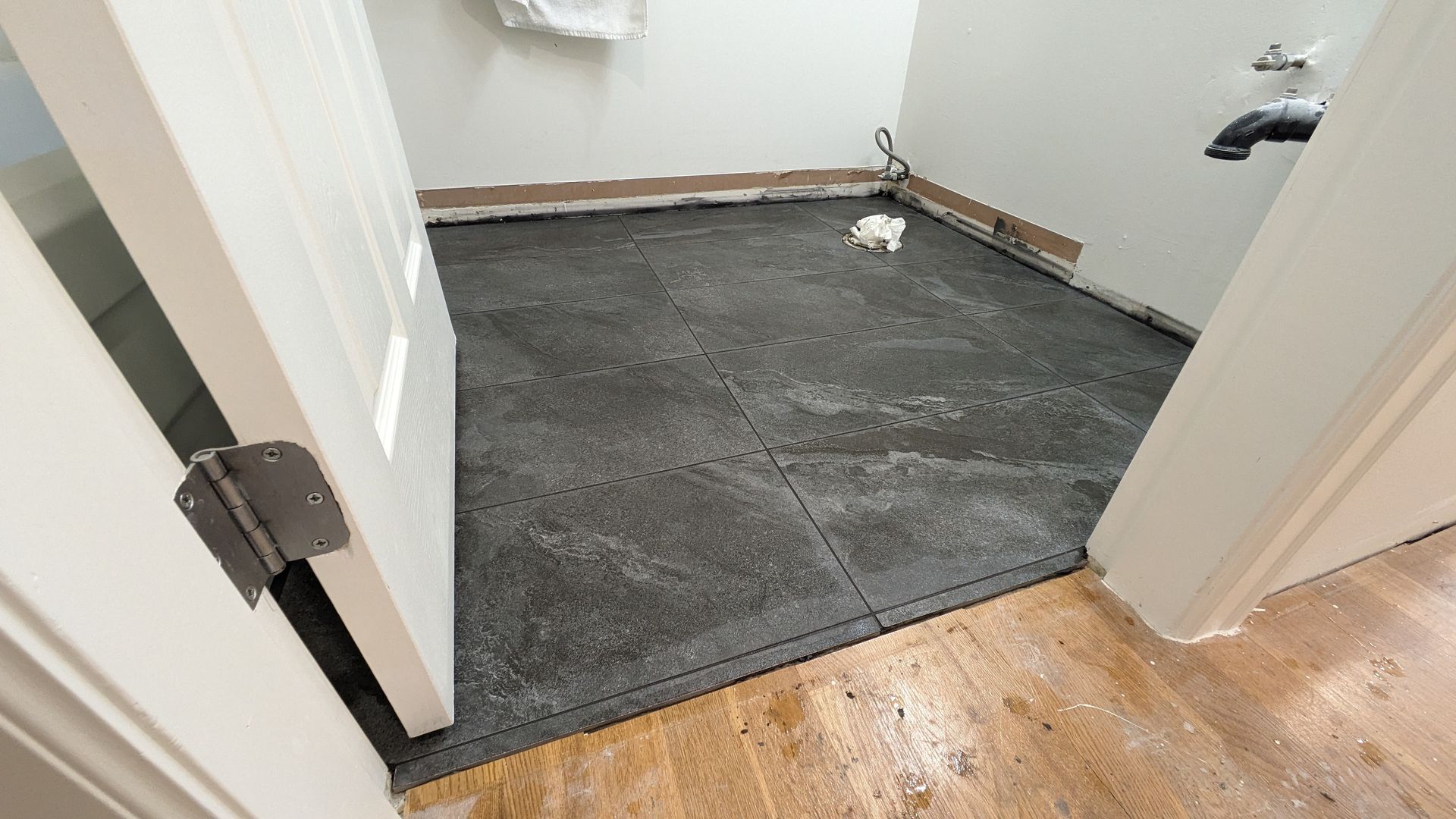 New granite tile floor installed in room