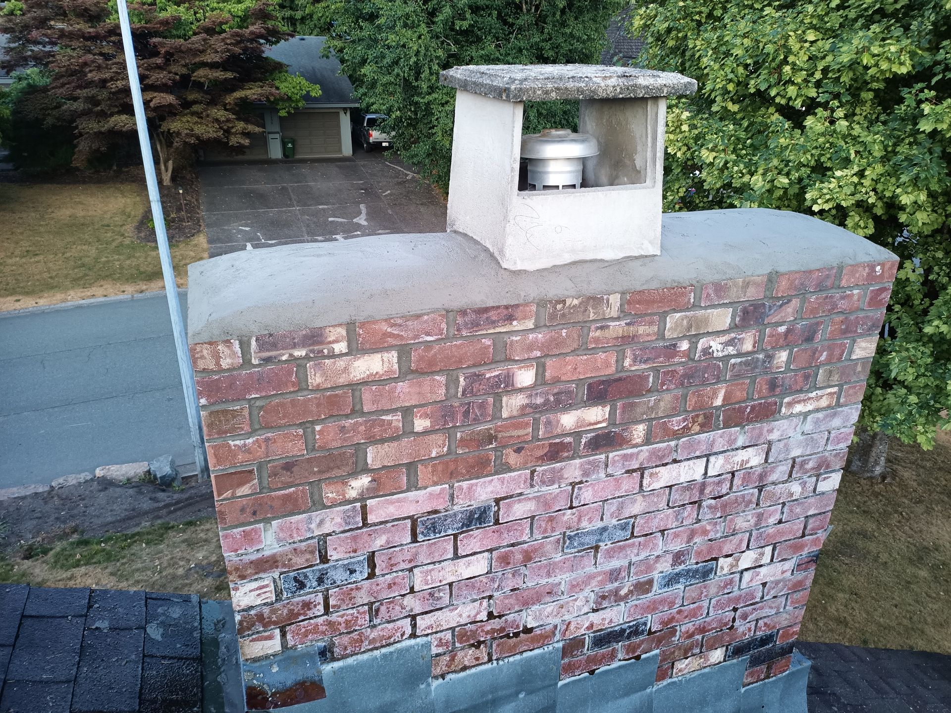 A new concrete cap installed on an old chimney in Vancouver BC.