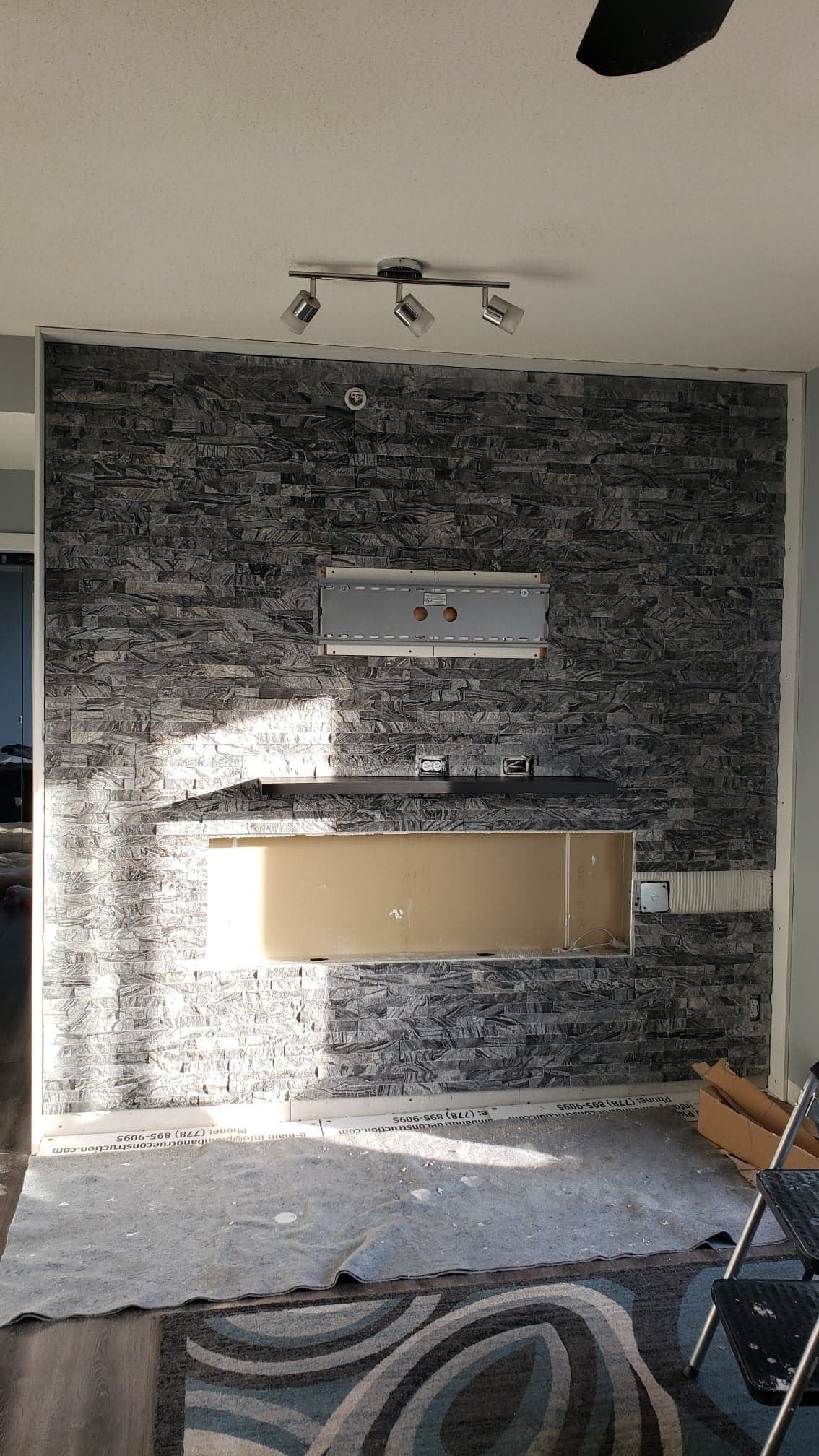 Newly built fireplace in final stages of completion.