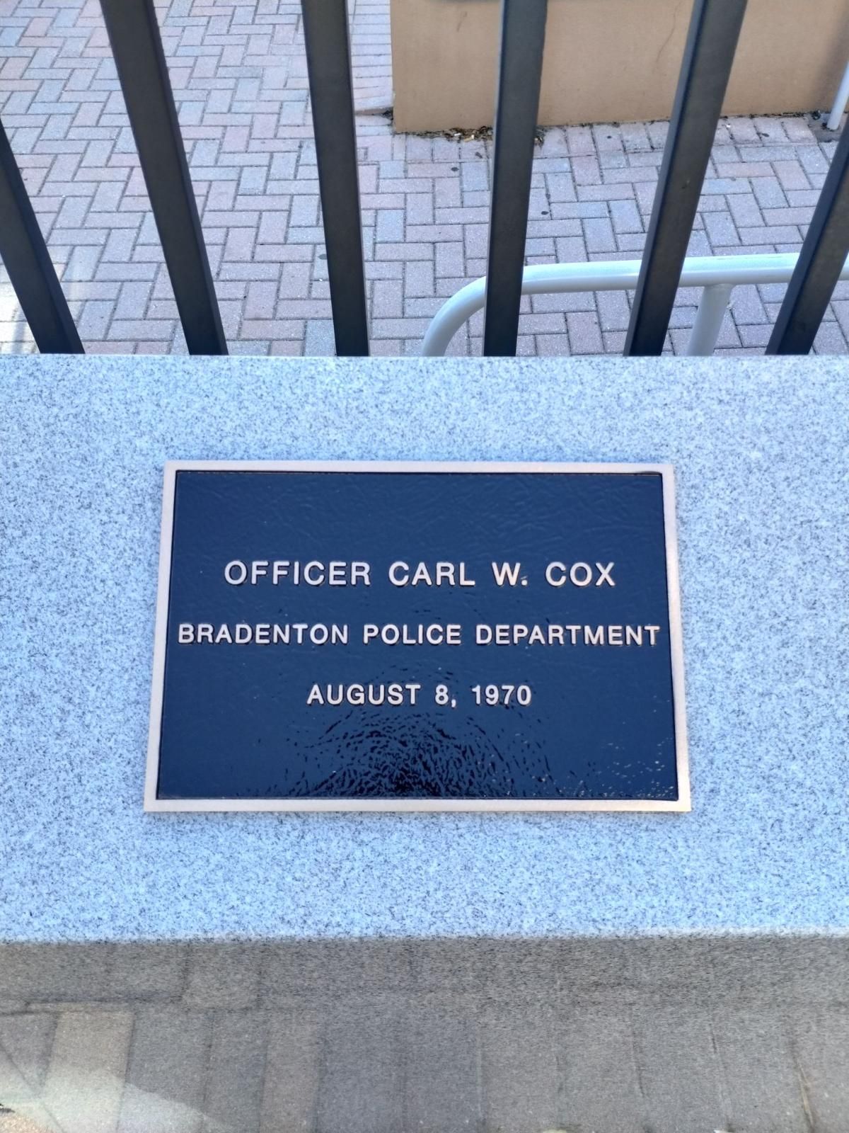 A plaque for officer carl w. cox from bradenton police department