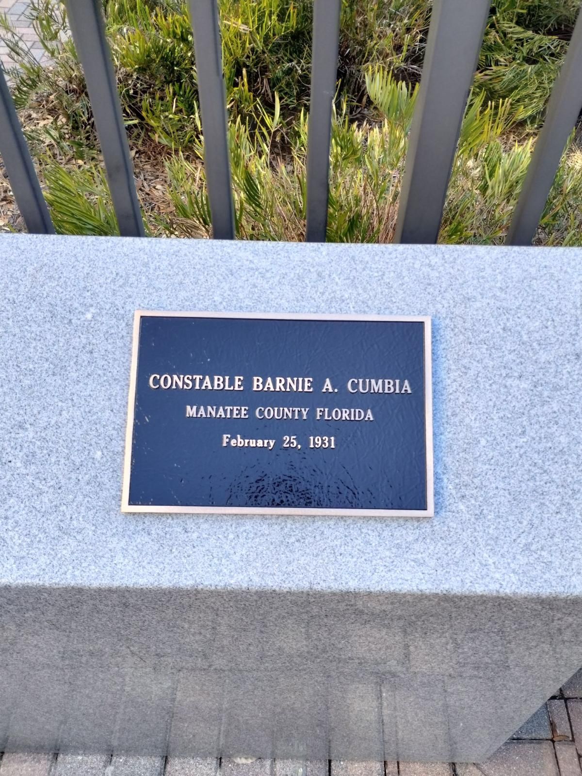 A plaque on a wall that says constable barnes