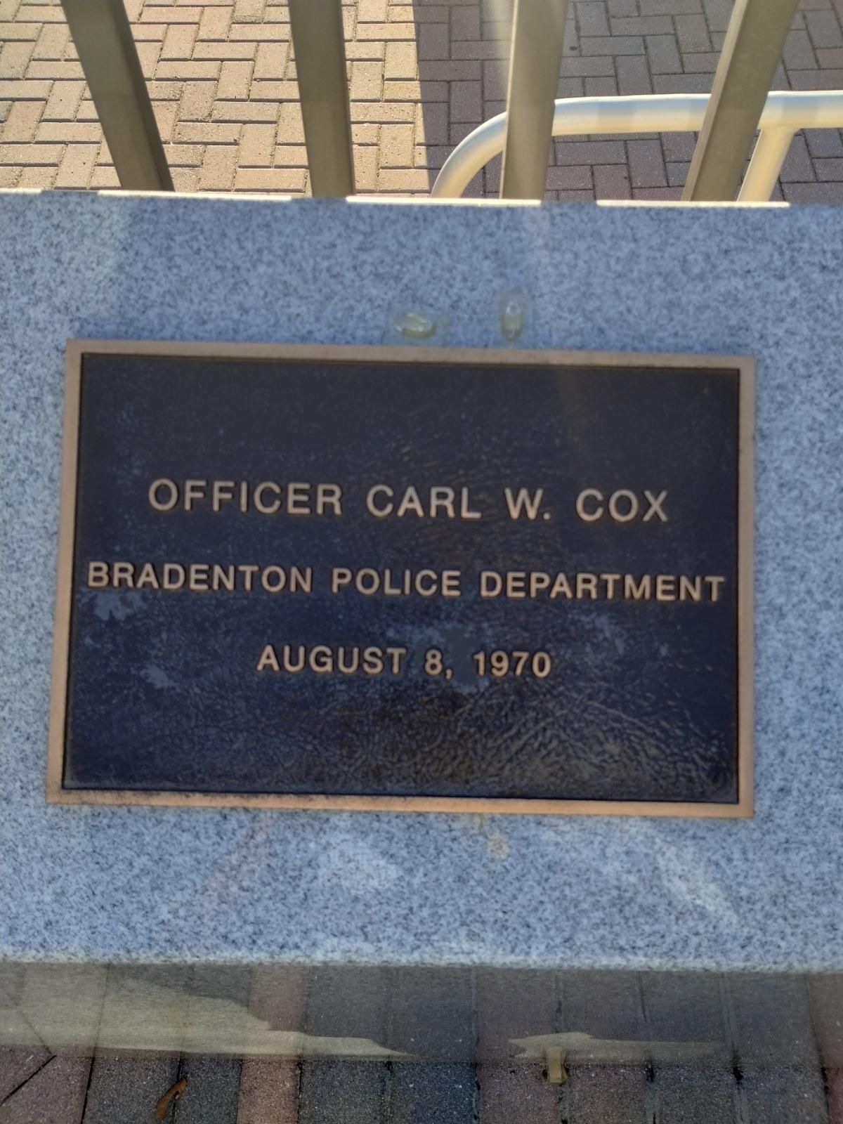 A plaque for officer carl w. cox from the bradenton police department