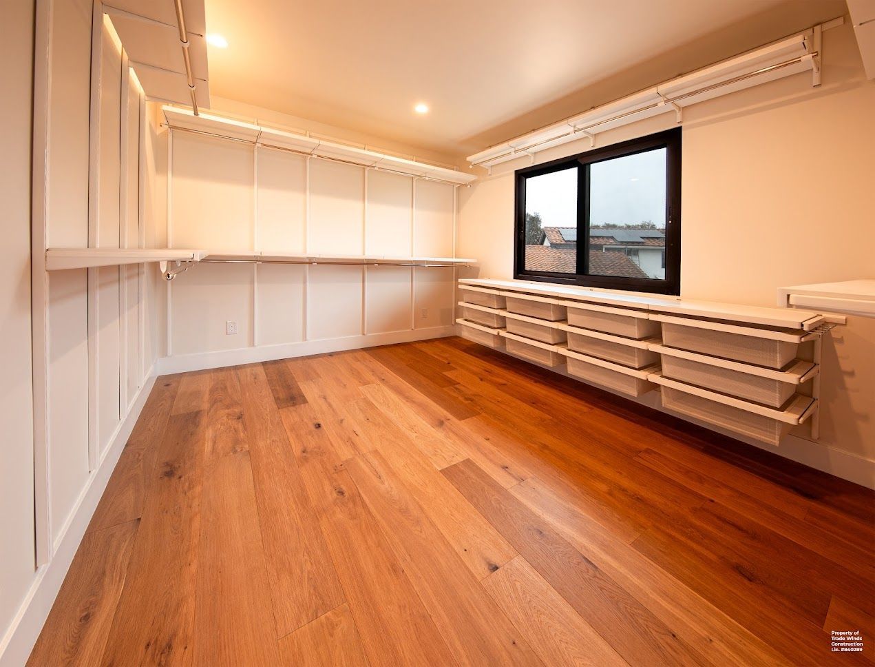 Empty Room With Hardwood Floors and Shelves
