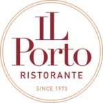 Logo for IL Porto Ristorante in burgundy, with “Since 1973” on a white circular background.