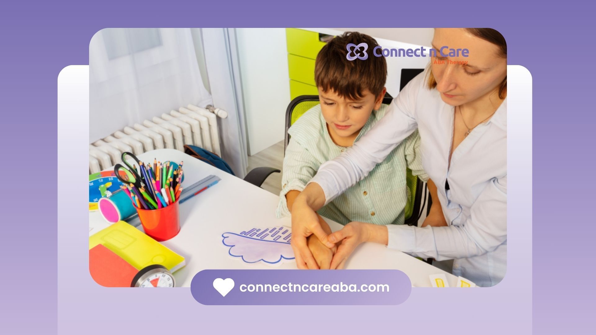 A woman and a child are sitting at a table making a heart with their hands. 