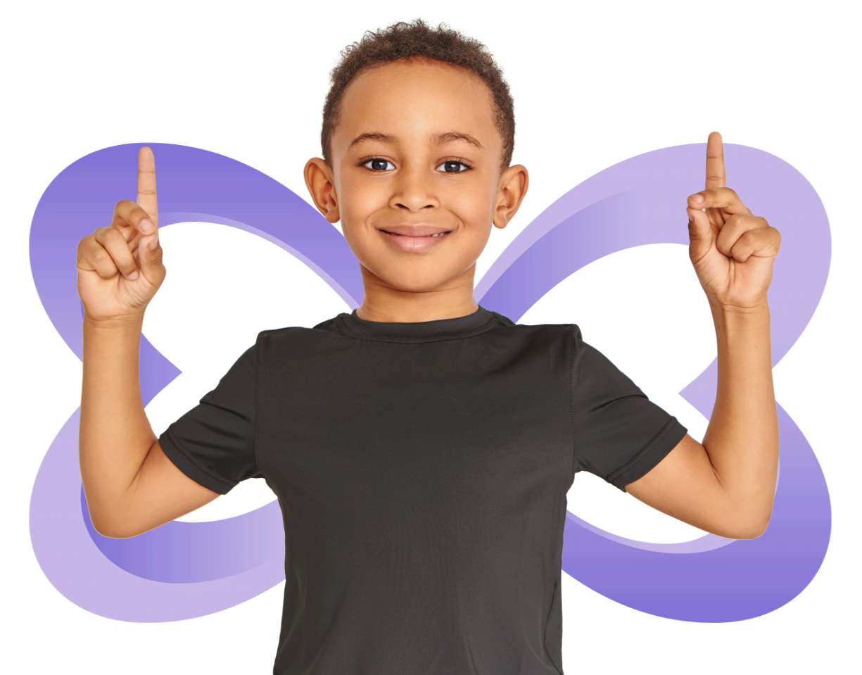 A young boy in a black shirt is pointing up with his fingers