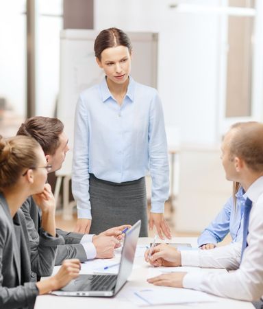 woman standing beside the clients