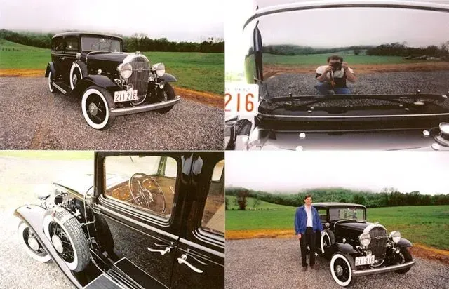a man is taking a picture of an old car with a license plate that says 216