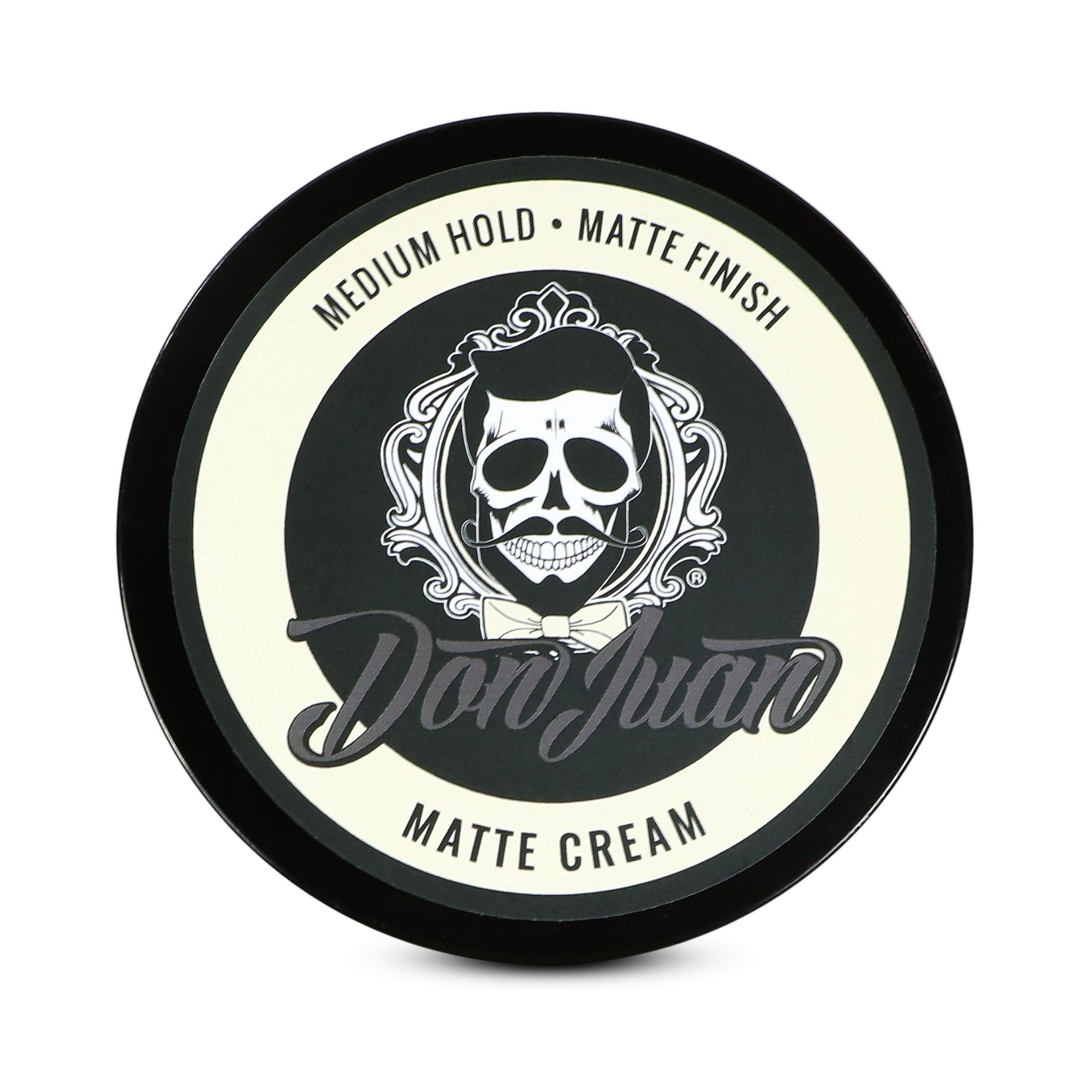 Pomada para el cabello Don Juan en lata color crema mate con logo de calavera y etiqueta negra y crema.