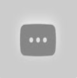 Gray chat bubble icon with three white dots