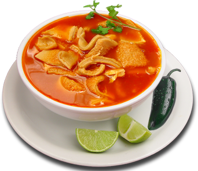 Bowl of tripe soup with lime, jalapeno, and cilantro.