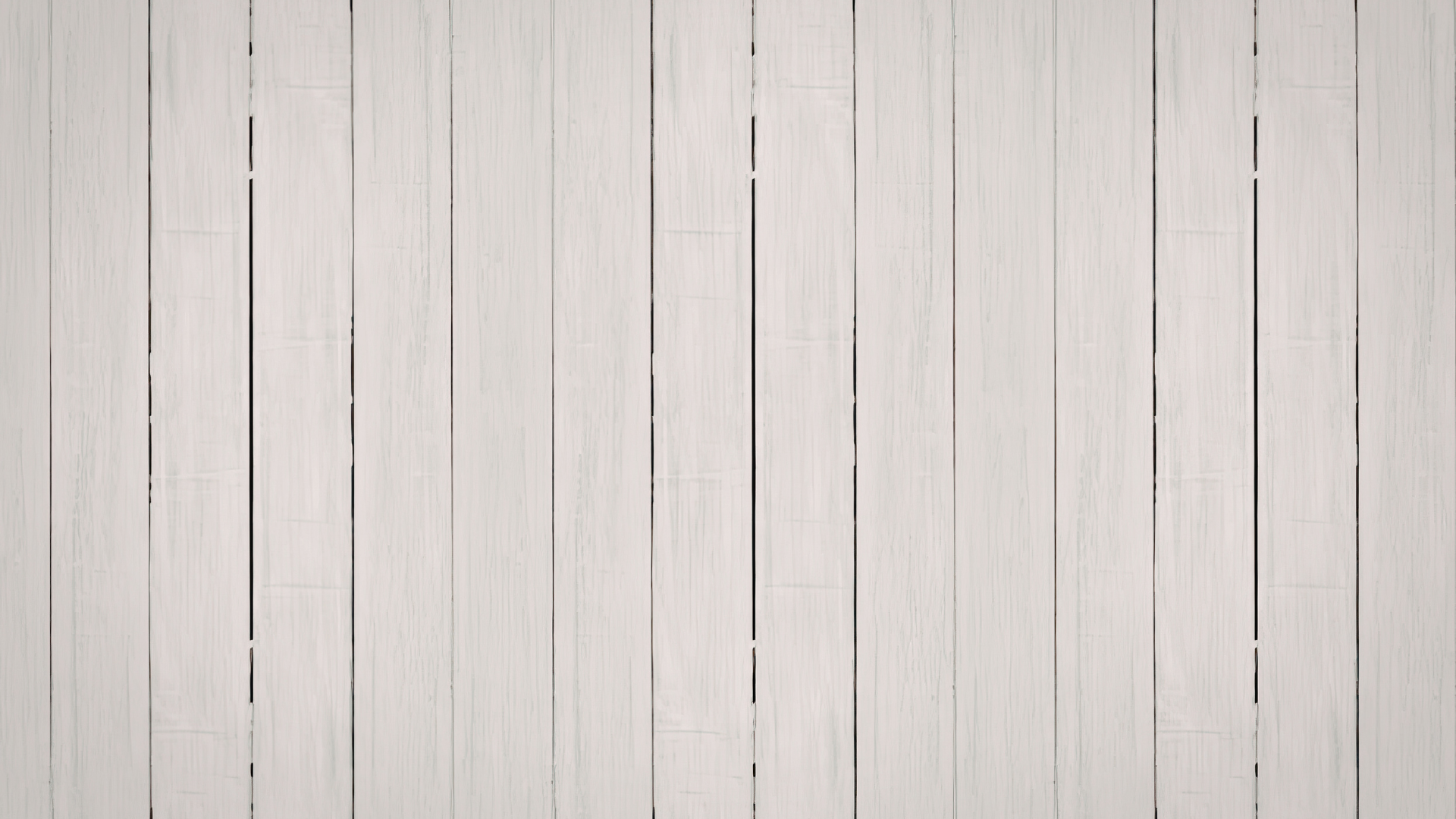 Vertical light gray wooden planks arranged side-by-side to form a textured background.