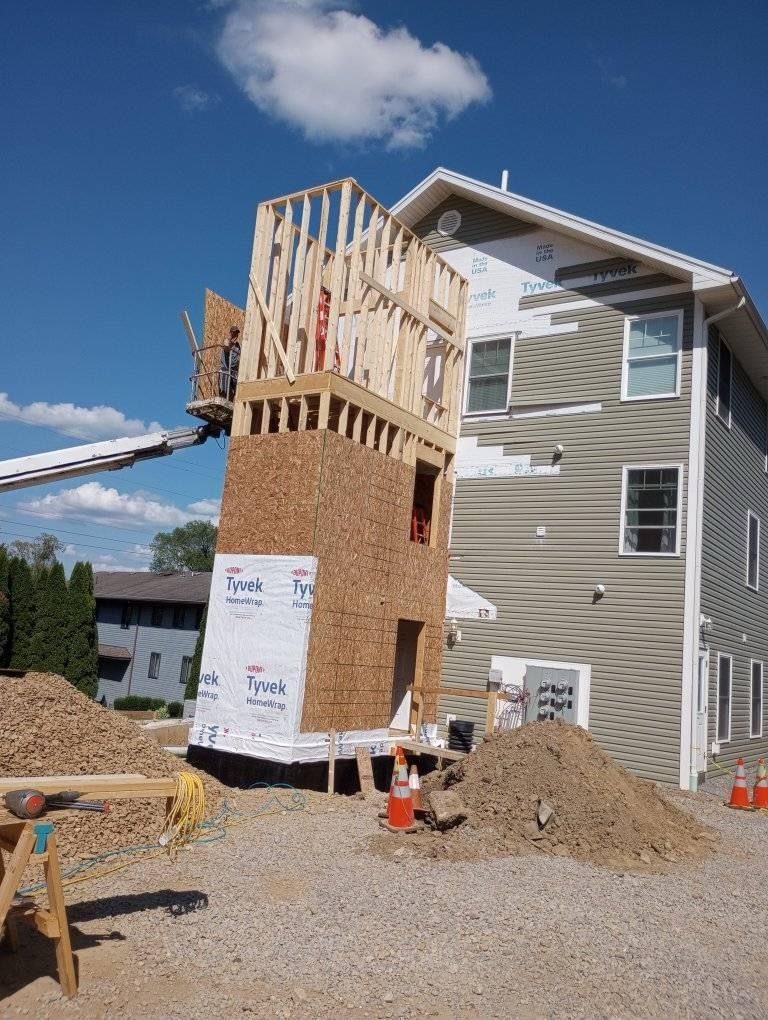 A house that is being built with styrofoam on it
