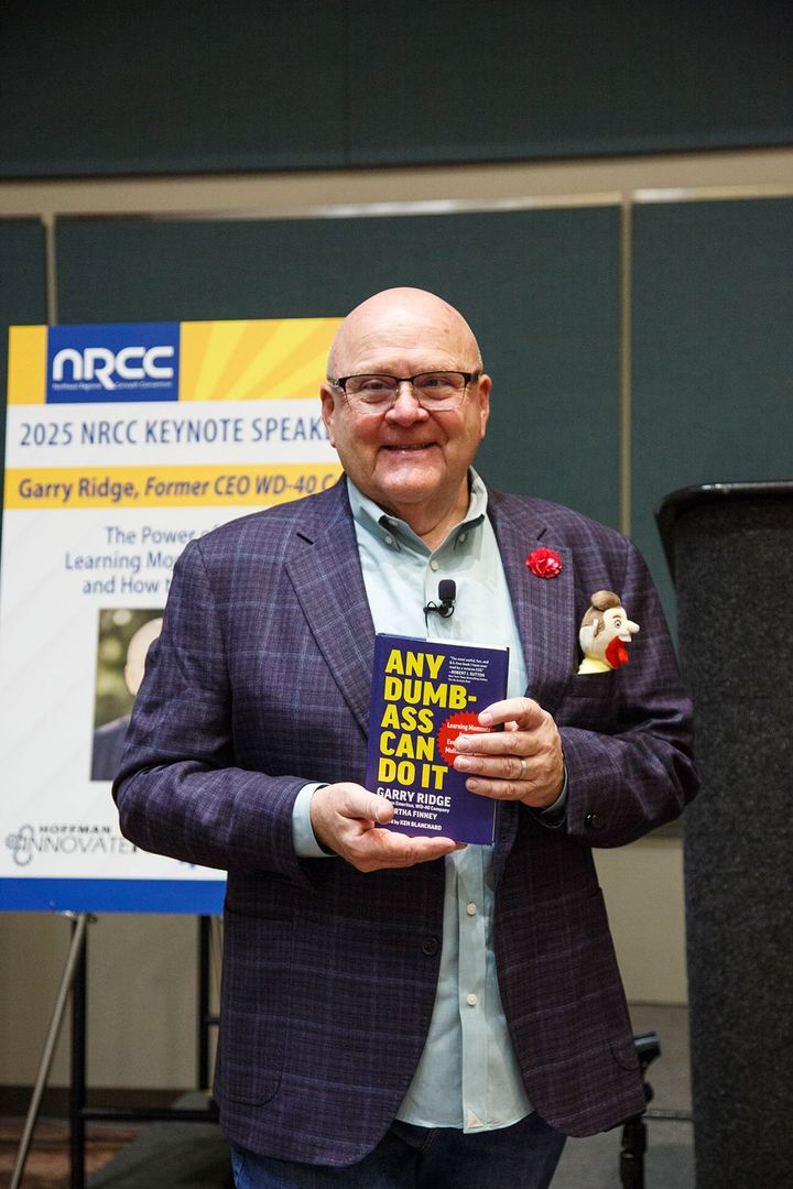 The 2025 Keynote Speaker, Garry Ridge, proudly displays his
most recent book, 