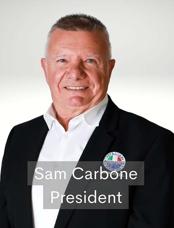 Portrait of Sam Carbone in a black suit and white shirt, labeled President