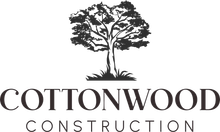 Cottonwood Construction logo with a black cottonwood tree and company name in serif text