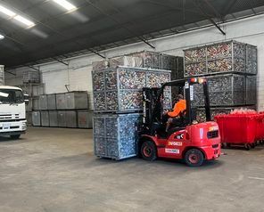 Man is Driving a Forklift in a Warehouse — Bundaberg Forklift Repairs Bundaberg, QLD