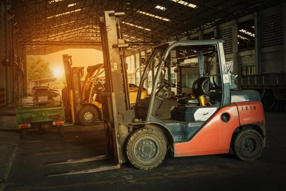 Forklift is Loading a Truck in a Warehouse — Bundaberg Forklift Repairs Bundaberg North, QLD