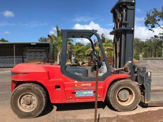 Red Forklift is Parked on the Side of the Road — Bundaberg Forklift Repairs Gayndah, QLD