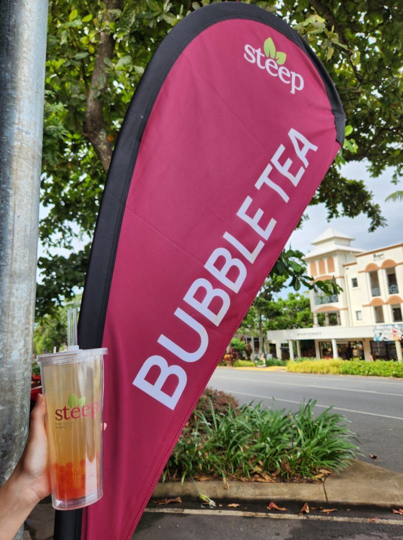 Hand Holding Bubble Tea Beside a Pink “bubble Tea” Flag — On The Spot Signs Port Douglas In Port Douglas, QLD
