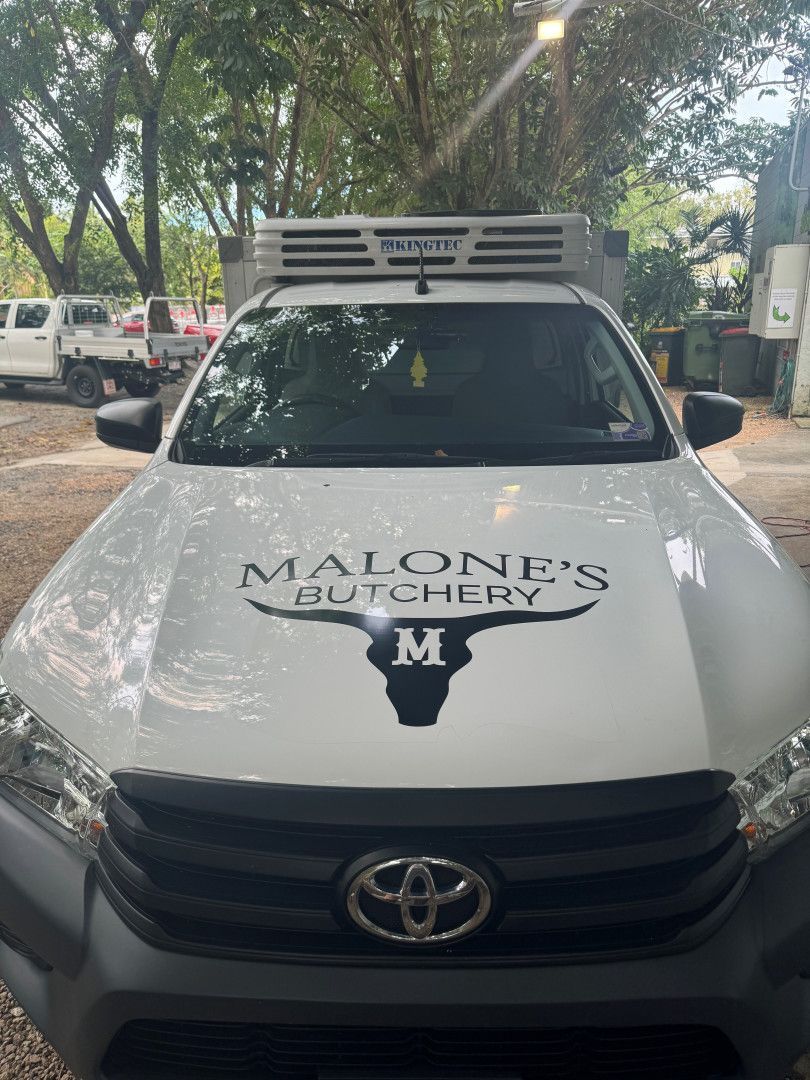 White Toyota vehicle with a 