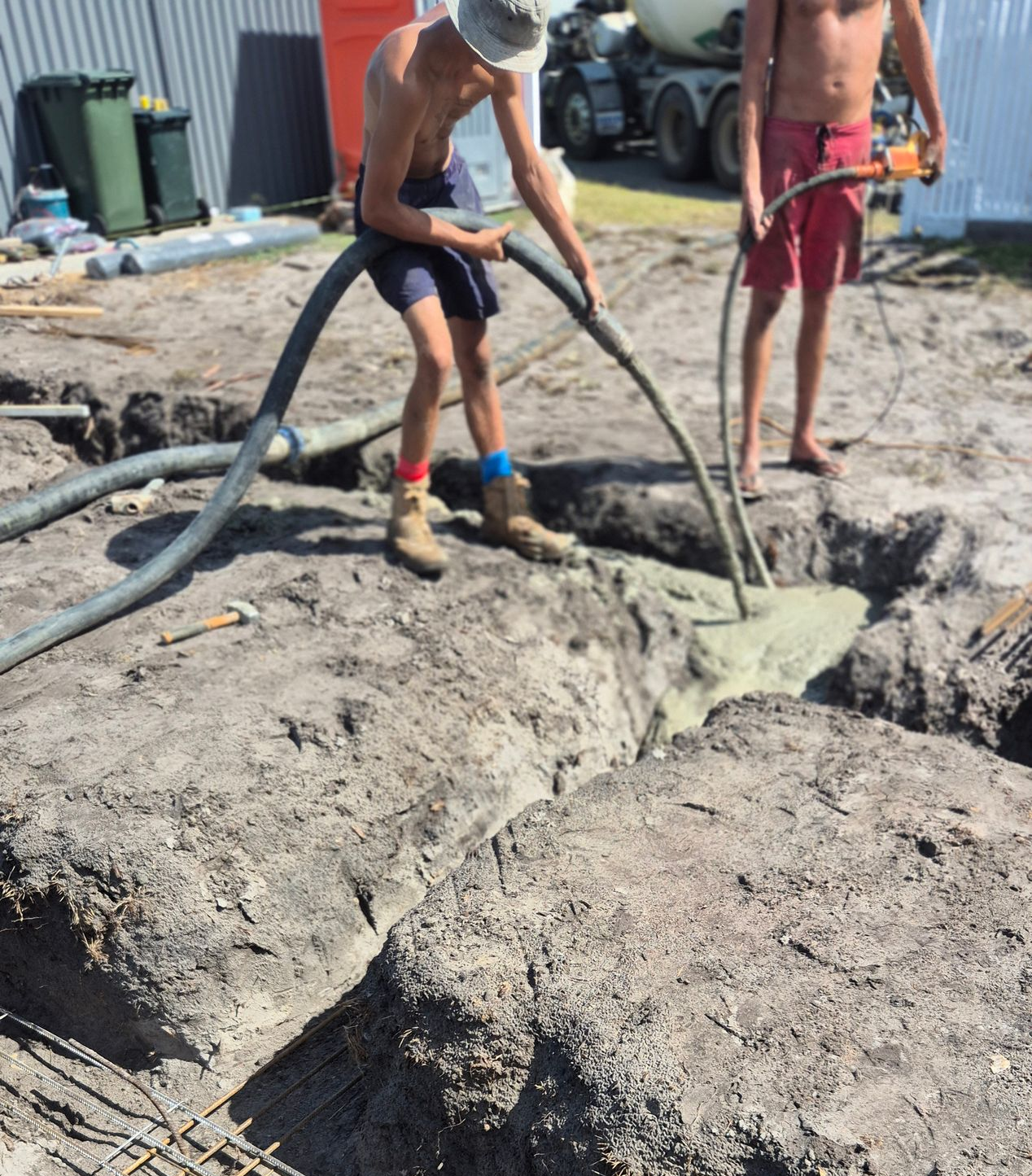 Wet hire line concrete pumping