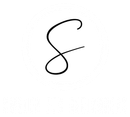 Black hand-drawn looping number or symbol on a white background