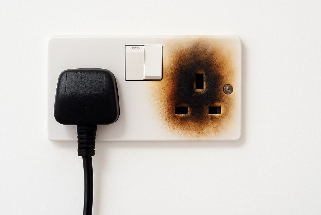 Derbyshire Electrical Specialists about to check a socket with electrical burning at a property in Derby