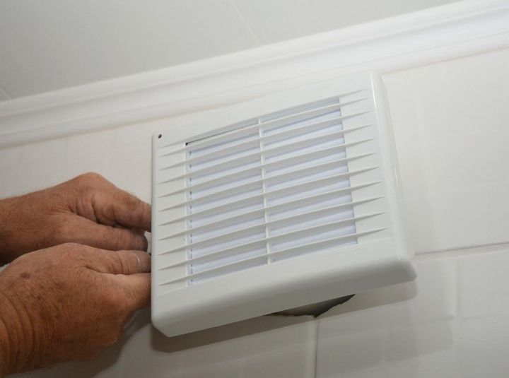 Derbyshire Electrical Specialists installing a bathroom extractor fan in Derby