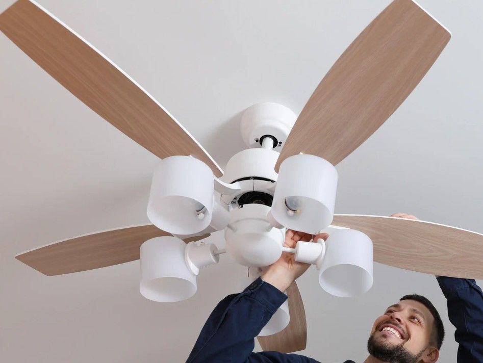 installing a ceiling fan in a living room in Derby