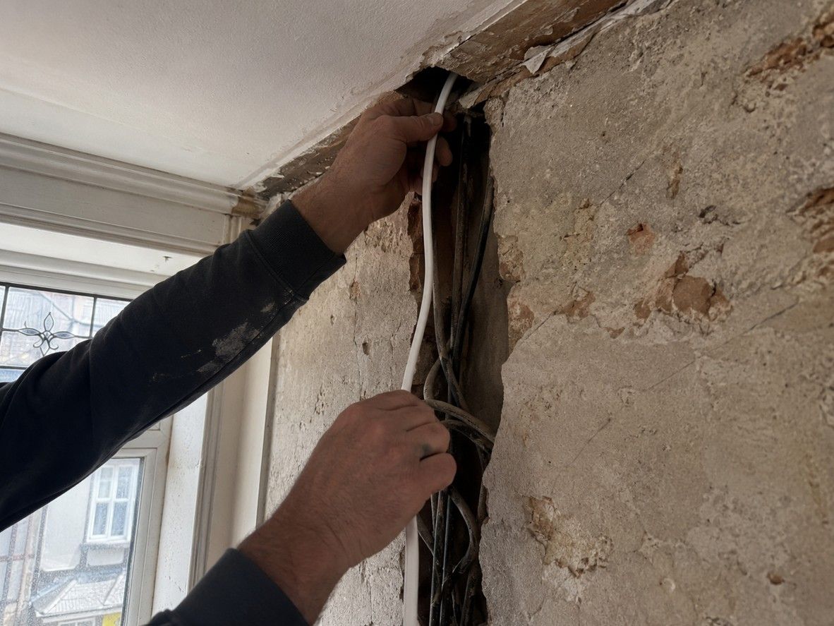 New cabling being installed during a rewire at an Alfreton property by Derbyshire Electrical Specialists